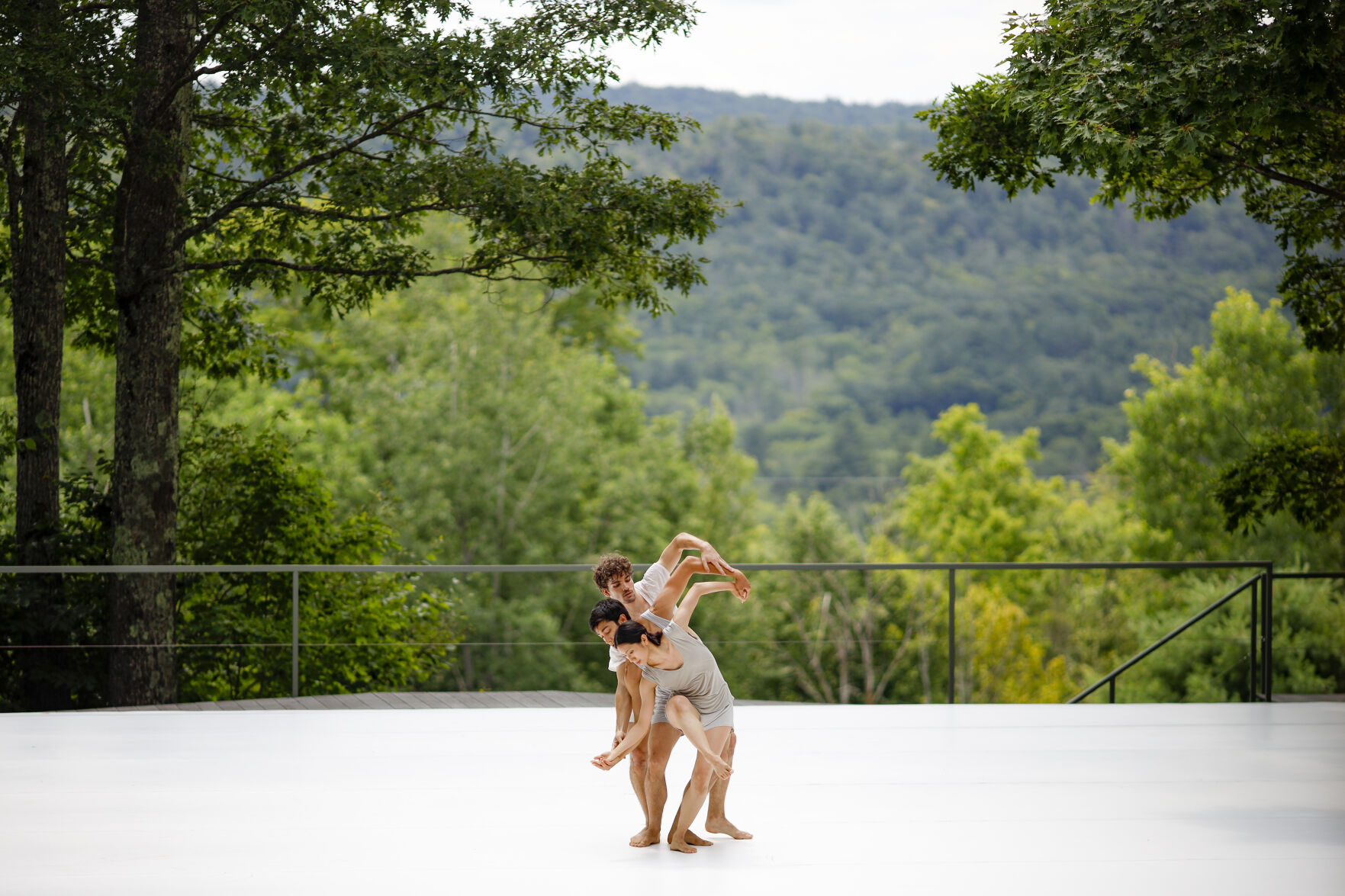 dancers perform on outdoor stage
